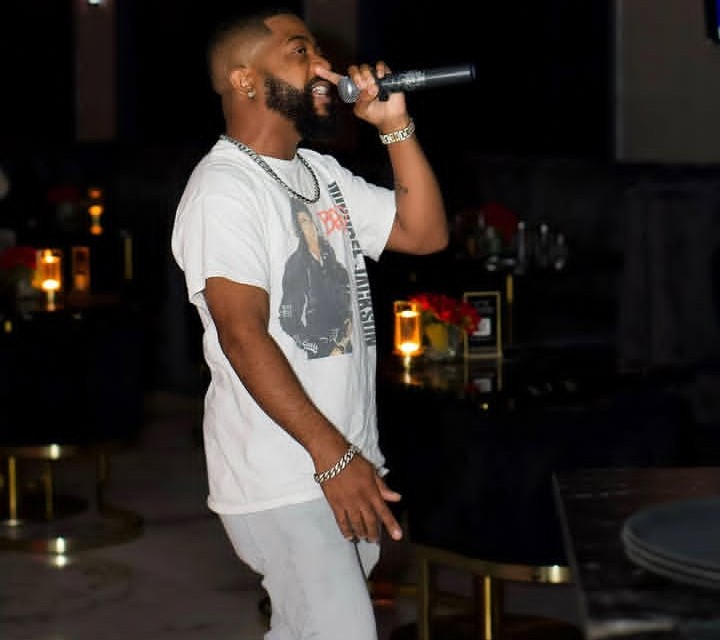 Karaoke performer on the mic at Tech & Tunes