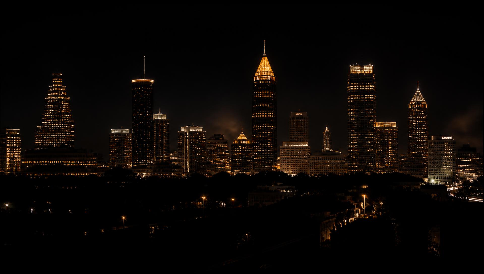 Atlanta skyline glowing gold at night